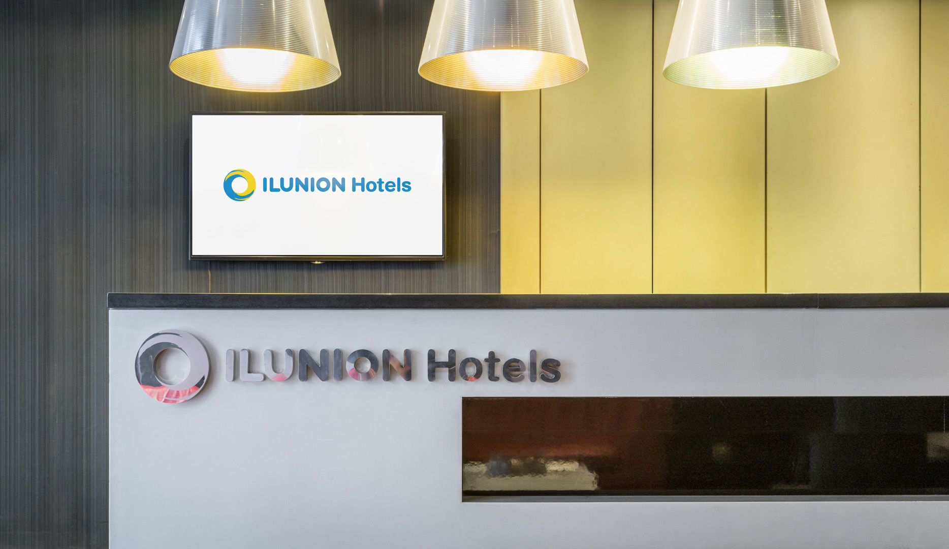 Ilunion Almirante Hotel Barcelona Logo gambar